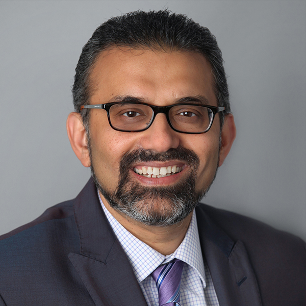 Dr. Munir Ahmed, MD, FACP headshot.